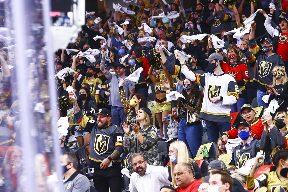 Golden Knights fans cheer at the start of Game 5 of a first-round NHL hockey playoff series aga ...