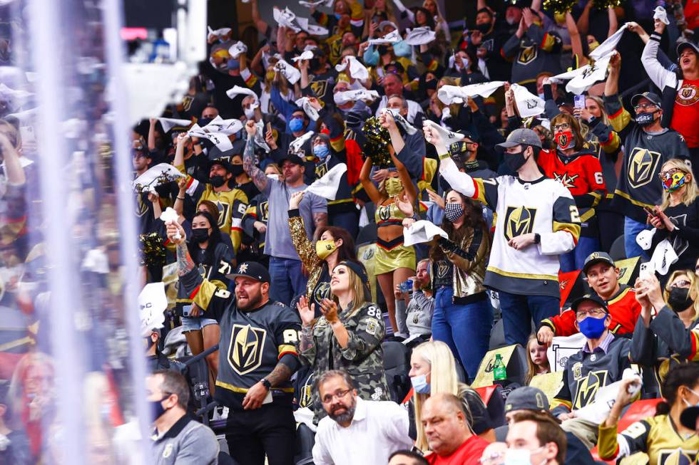 Golden Knights fans cheer at the start of Game 5 of a first-round NHL hockey playoff series aga ...