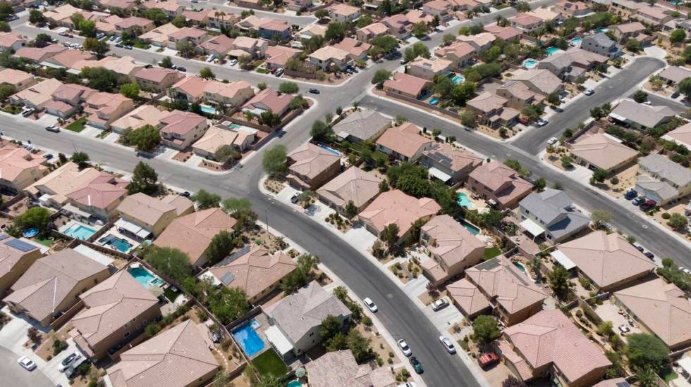 An aerial view of housing near Night Owl Bluff Avenue and West Gentle Brook Street in North Las ...