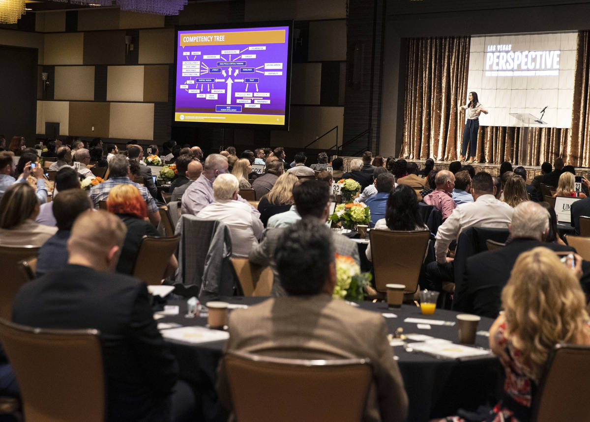 Attendees listen as Erica Orange, executive vice president and chief operating officer of The F ...