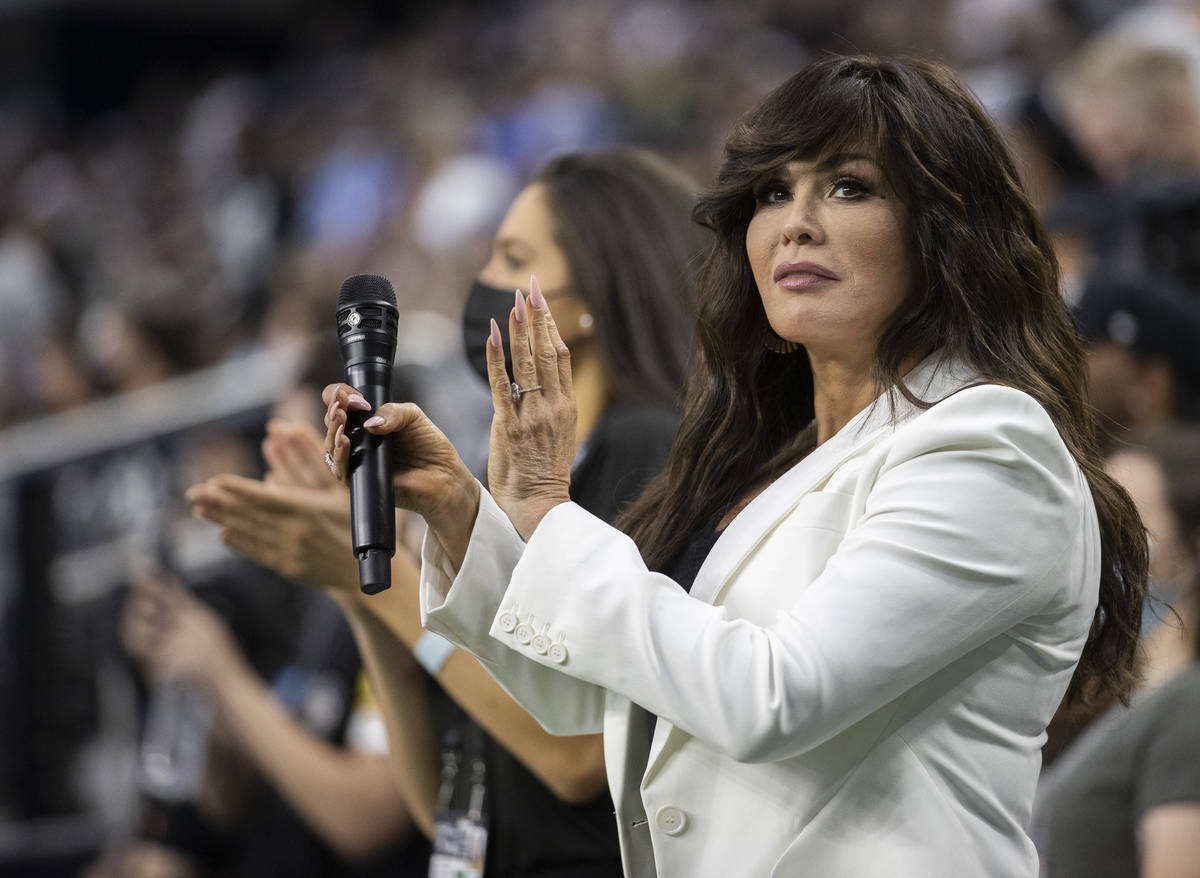 Marie Osmond waits to perform the national anthem before the start of an NFL preseason football ...