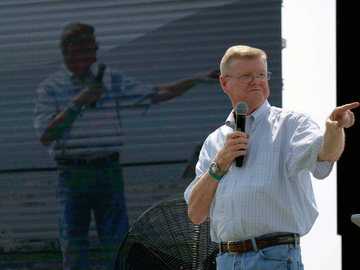 Republican Rep. Mark Amodei appears live and on a big video screen at the 6th annual Basque Fry ...