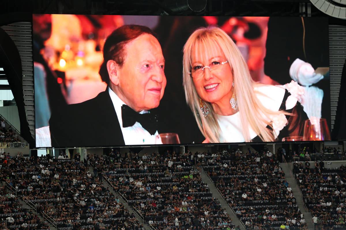 Dr. Miriam Adelson and her late husband Sheldon Adelson are honored before the lighting of the ...