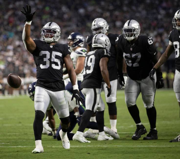 Raiders running back BJ Emmons (35) celebrates a big run in the second quarter during an NFL pr ...