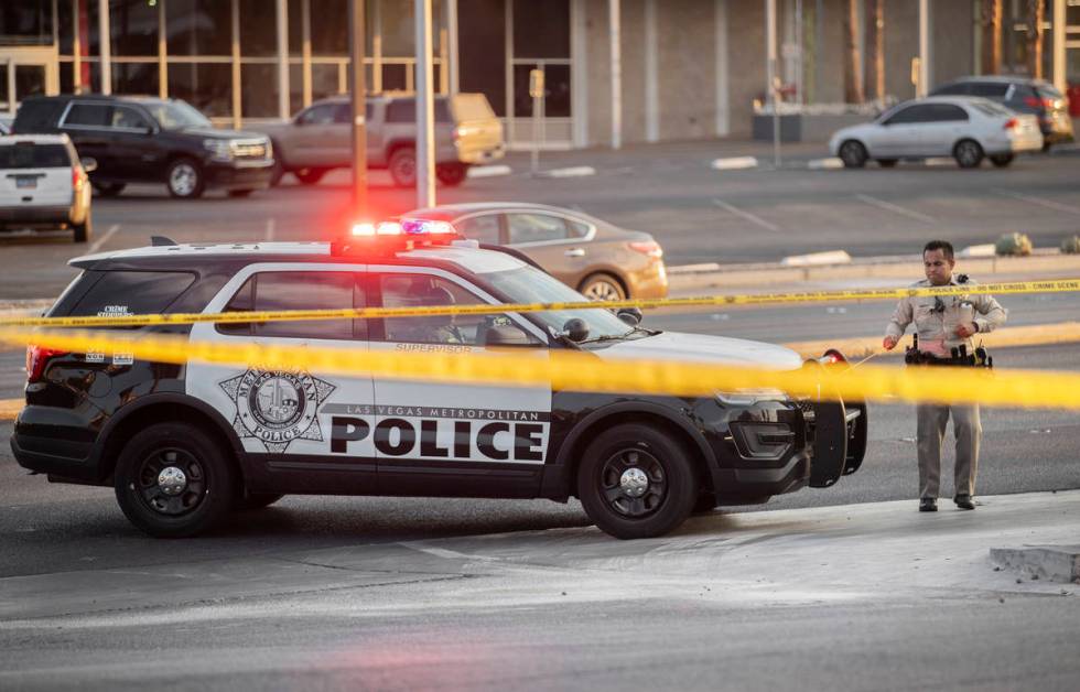 Las Vegas Metropolitan Police investigate a homicide at East Charleston Boulevard and South Mar ...