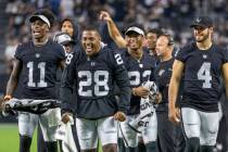 (From left) Raiders wide receiver Henry Ruggs III (11), running back Josh Jacobs (28), running ...