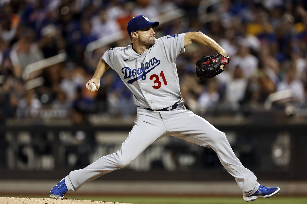 Los Angeles Dodgers pitcher Max Scherzer delivers a pitch during the second inning of a basebal ...