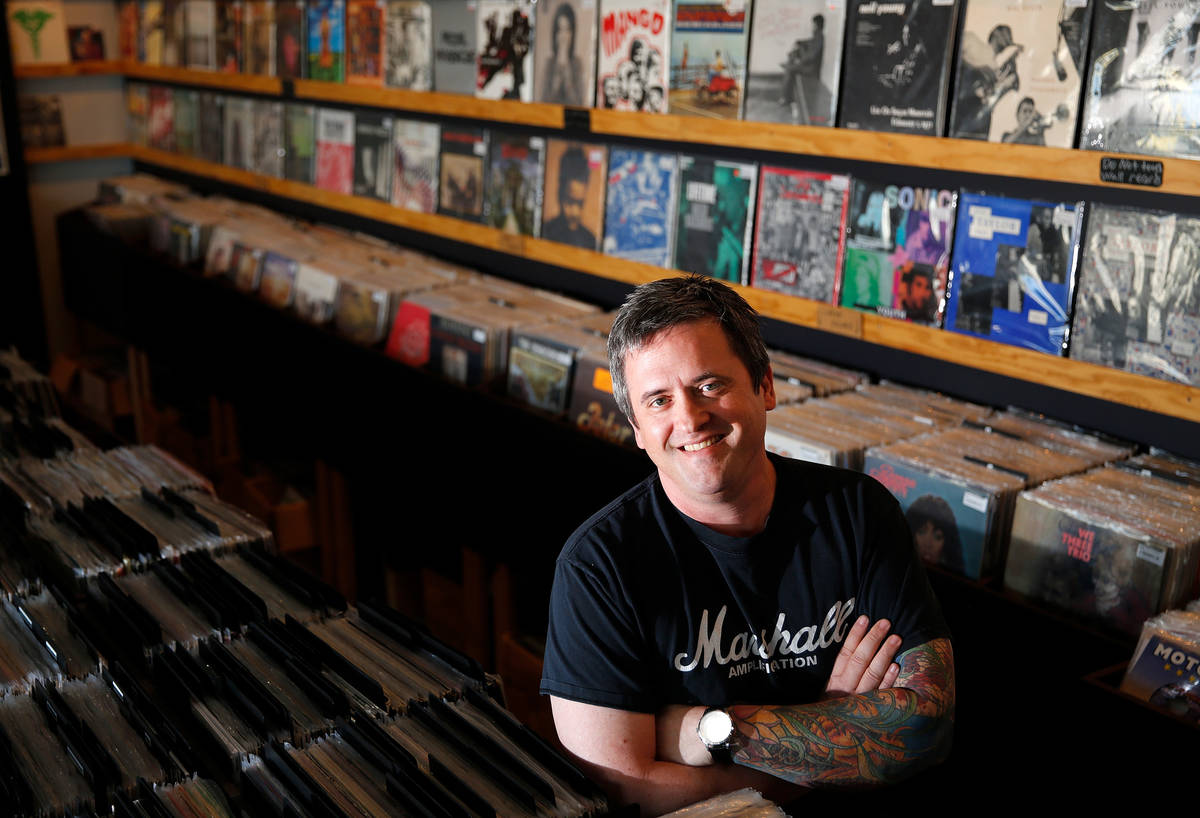 Ronald Corso, owner of 11th Street Records poses for a photo at his record store in Las Vegas, ...