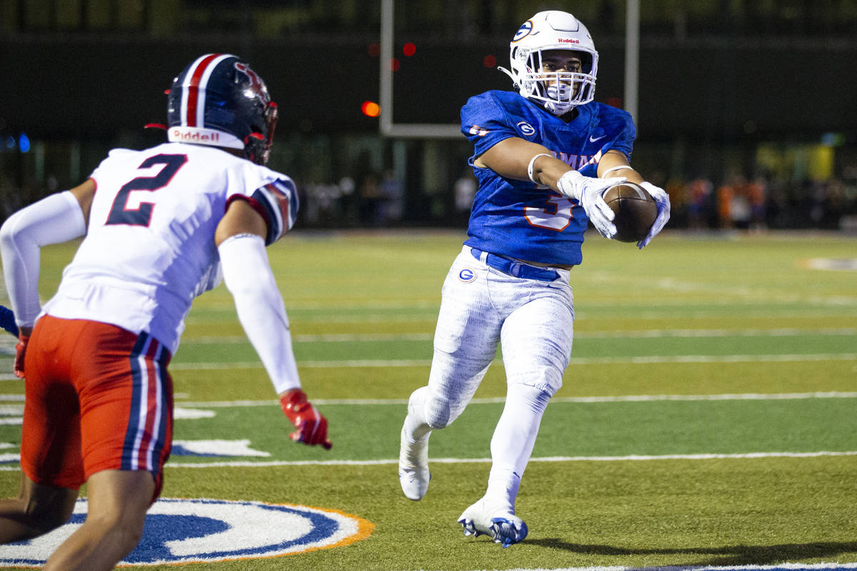 Bishop Gorman's Cam'ron Barfield (3) runs for a touchdown during the second quarter of a footb ...