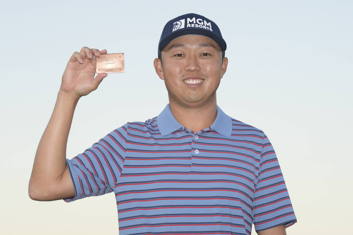 David Lipsky shows off his PGA Tour card after earning his promotion from the Korn Ferry Tour d ...