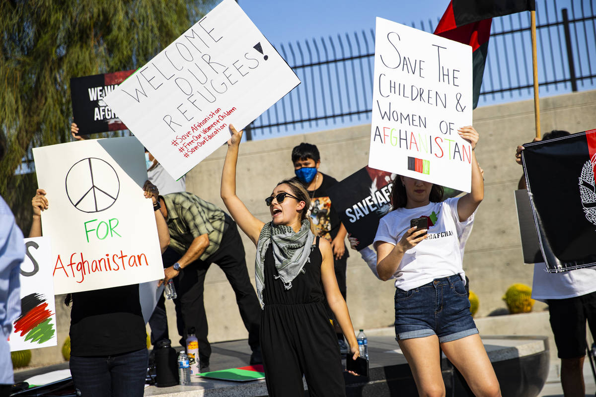 Medinah Yusufzai, center, participates during a protest against the Taliban and in support of A ...