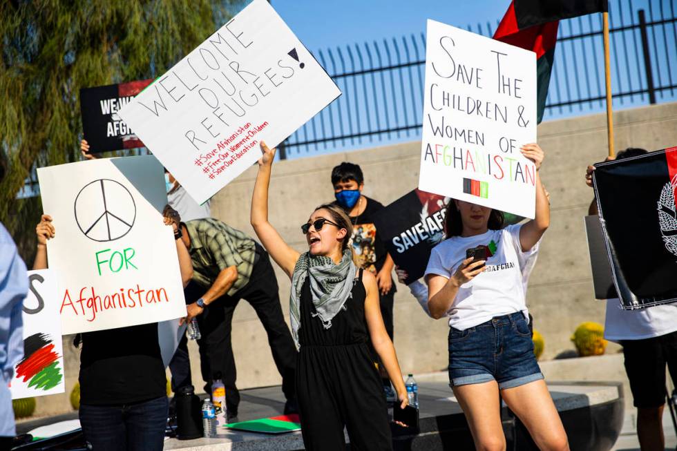 Medinah Yusufzai, center, participates during a protest against the Taliban and in support of A ...