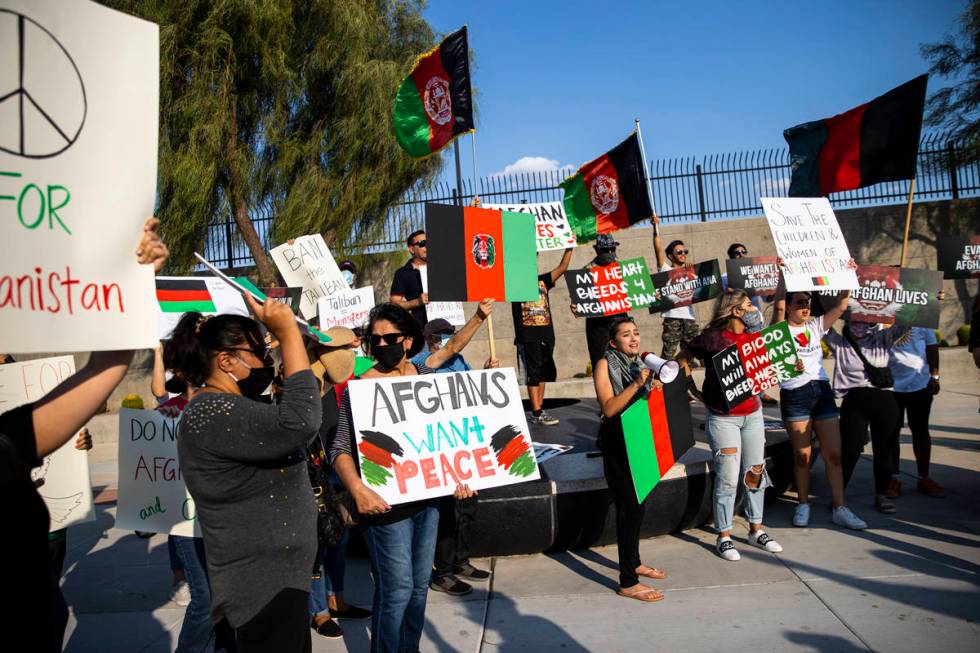 Medinah Yusufzai, center right, speaks during a protest against the Taliban and in support of A ...