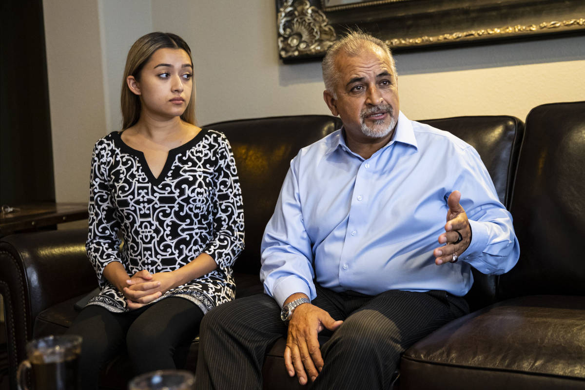 Rokai Yusufzai, who immigrated from Afghanistan to the U.S., right, talks about the fall of Kab ...