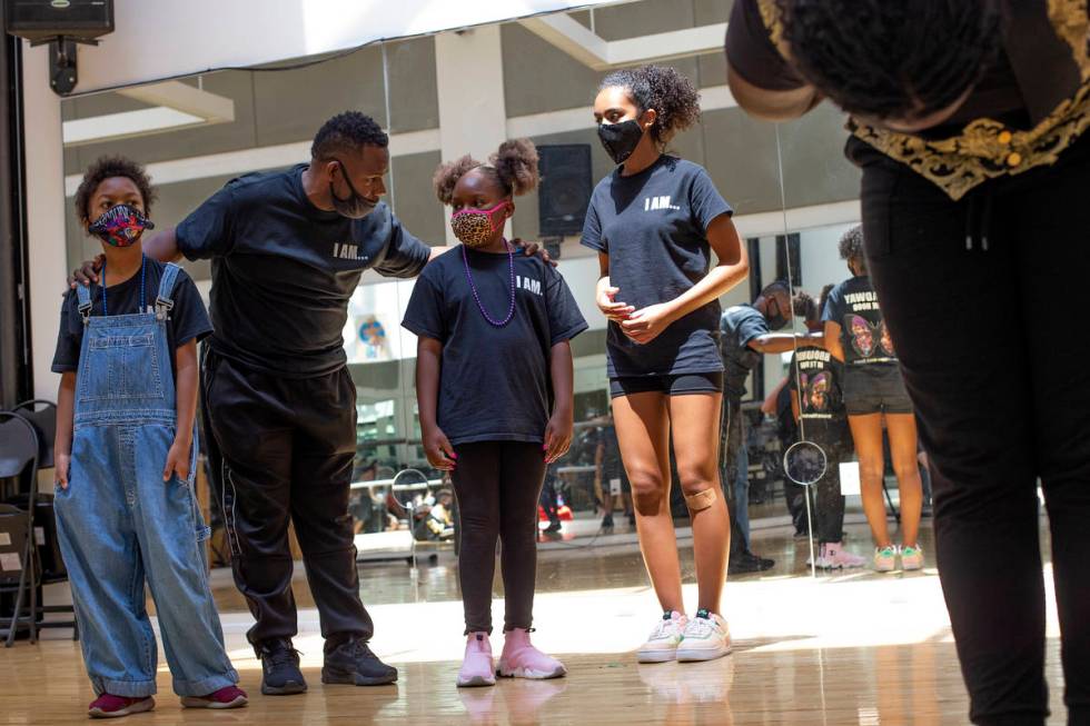 Torrey Russell, founding director of Broadway in the HOOD, directs a rehearsal for the group's ...
