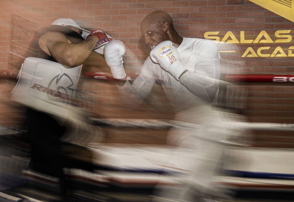 Welterweight Yordenis Ugas, right, trains for his upcoming fight with Manny Pacquiao on Monday, ...