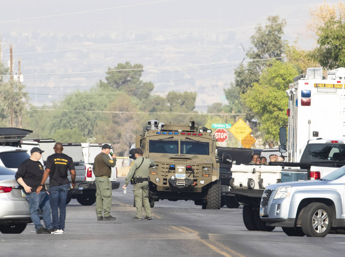 Las Vegas police homicide and SWAT officers are presence involving a homicide investigation in ...