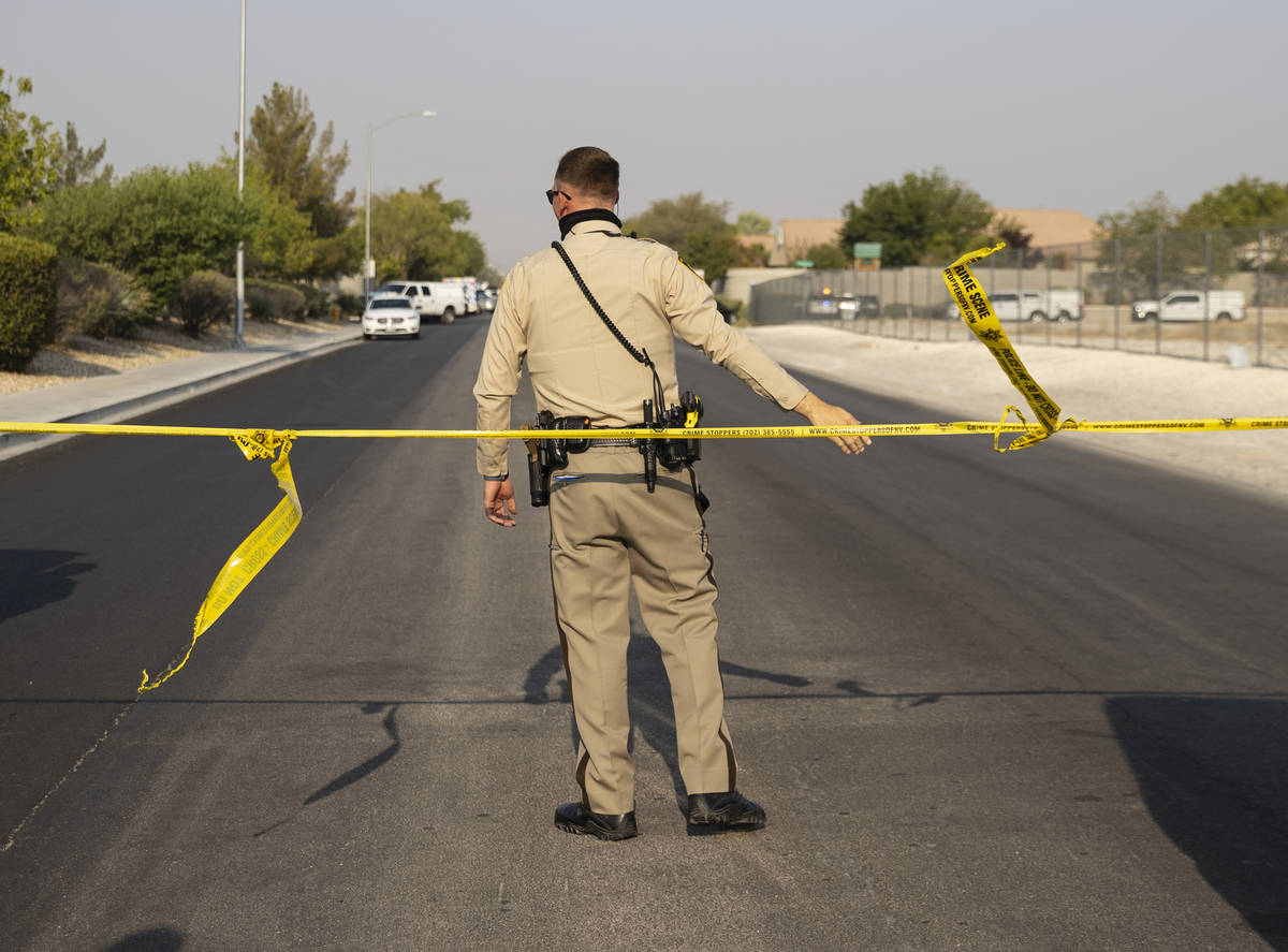 Las Vegas police homicide and SWAT officers are presence involving a homicide investigation in ...