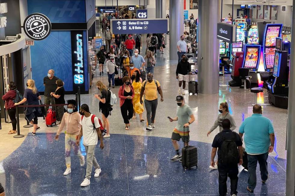 McCarran International Airport had 4.15 million travelers passing through its gates in July. (K ...