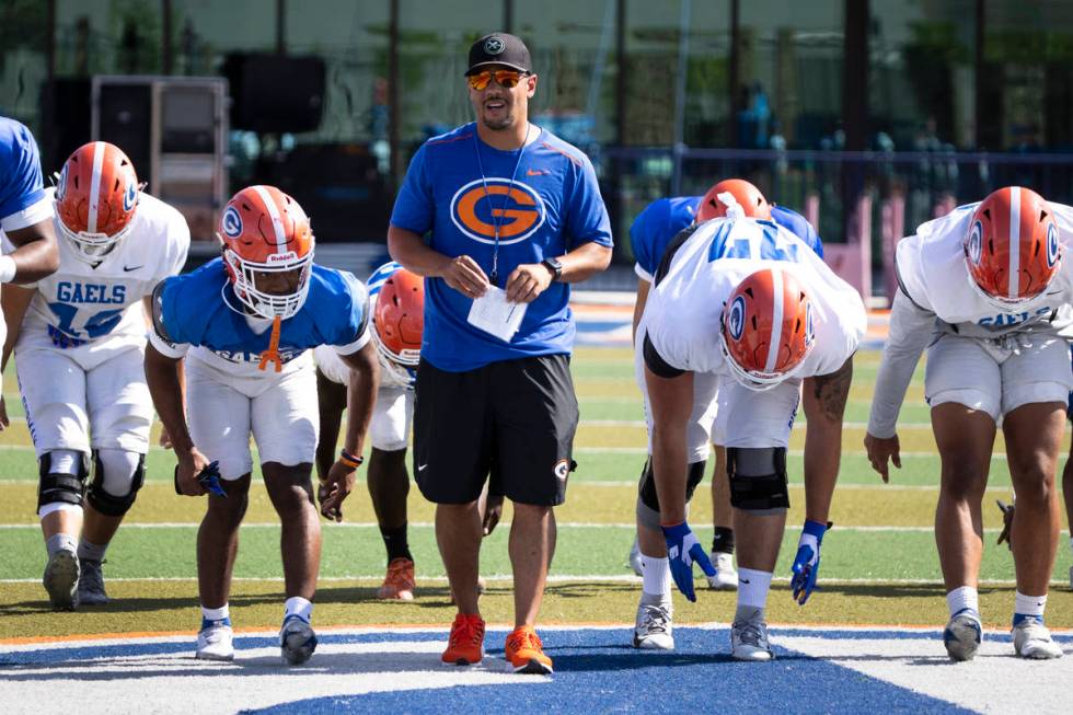 Bishop Gorman High School head coach Brent Browner watches his players during teamÕs pract ...