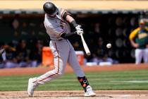 San Francisco Giants' Kris Bryant hits a two-run home run against the Oakland Athletics during ...