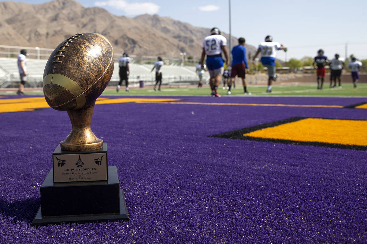 The "Air Space Showdown" trophy is posed as the Sunrise Mountain High School varsity ...
