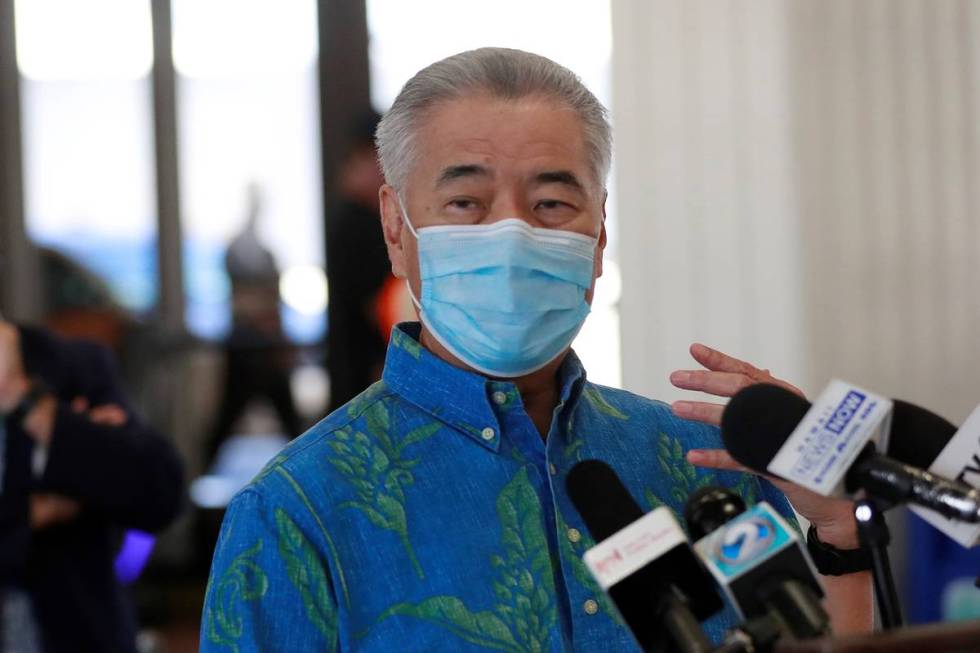 Hawaii Gov. David Ige speaks at a news conference at the Daniel K. Inouye International Airport ...