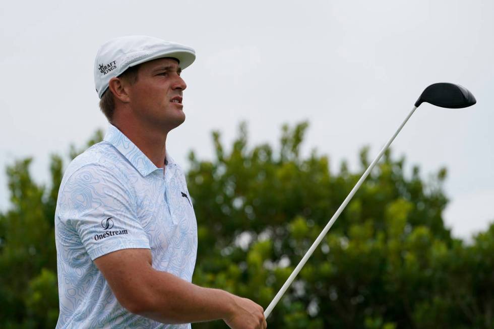 Bryson DeChambeau watches his shot off the third tee in the third round at the Northern Trust g ...