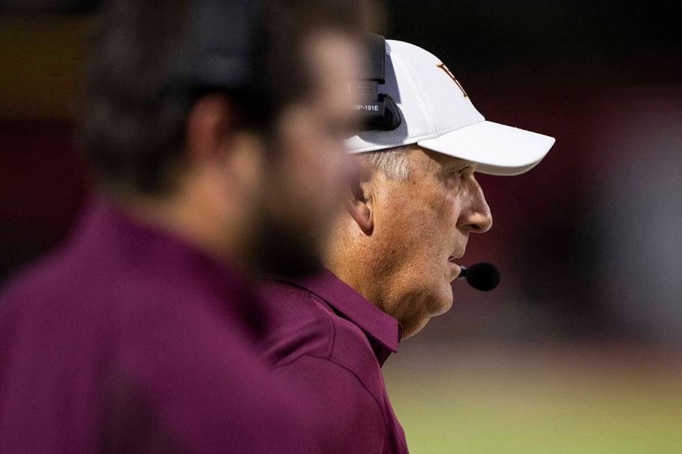 Faith Lutheran's head coach Mike Sandford watches his team play Arbor View during the first hal ...