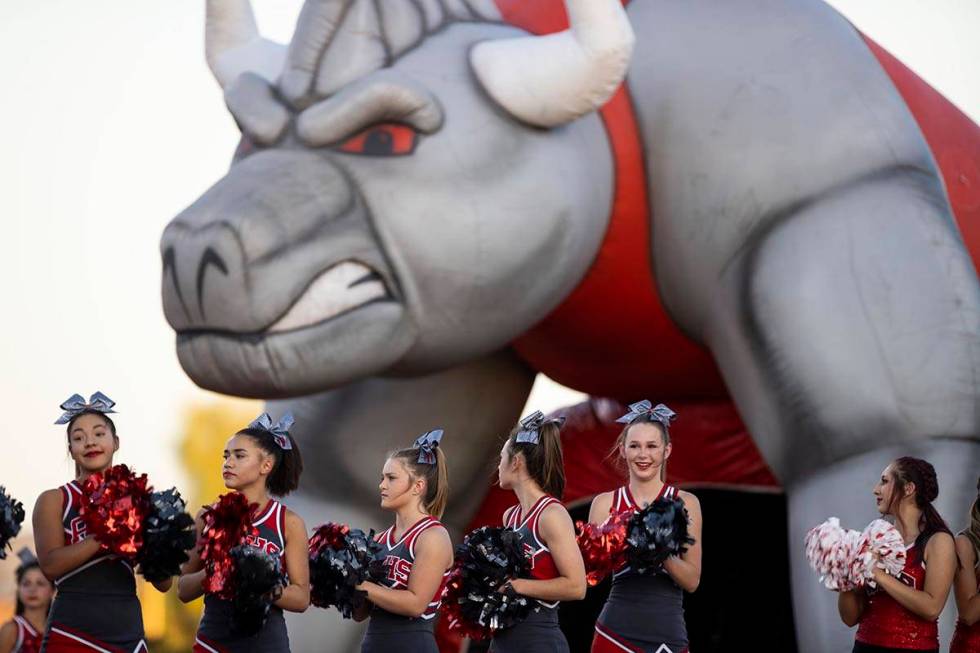 Cheerleaders get ready before the start of a football game between Arbor View and Faith Luthera ...