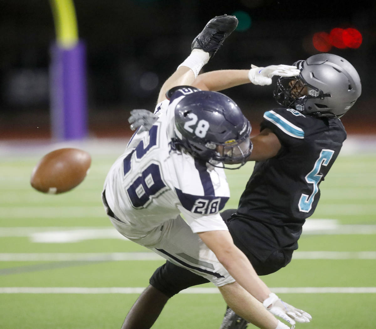 Silverado High School's Jaden Thrower (5) fails to make the catch against Shadow Ridge High Sch ...