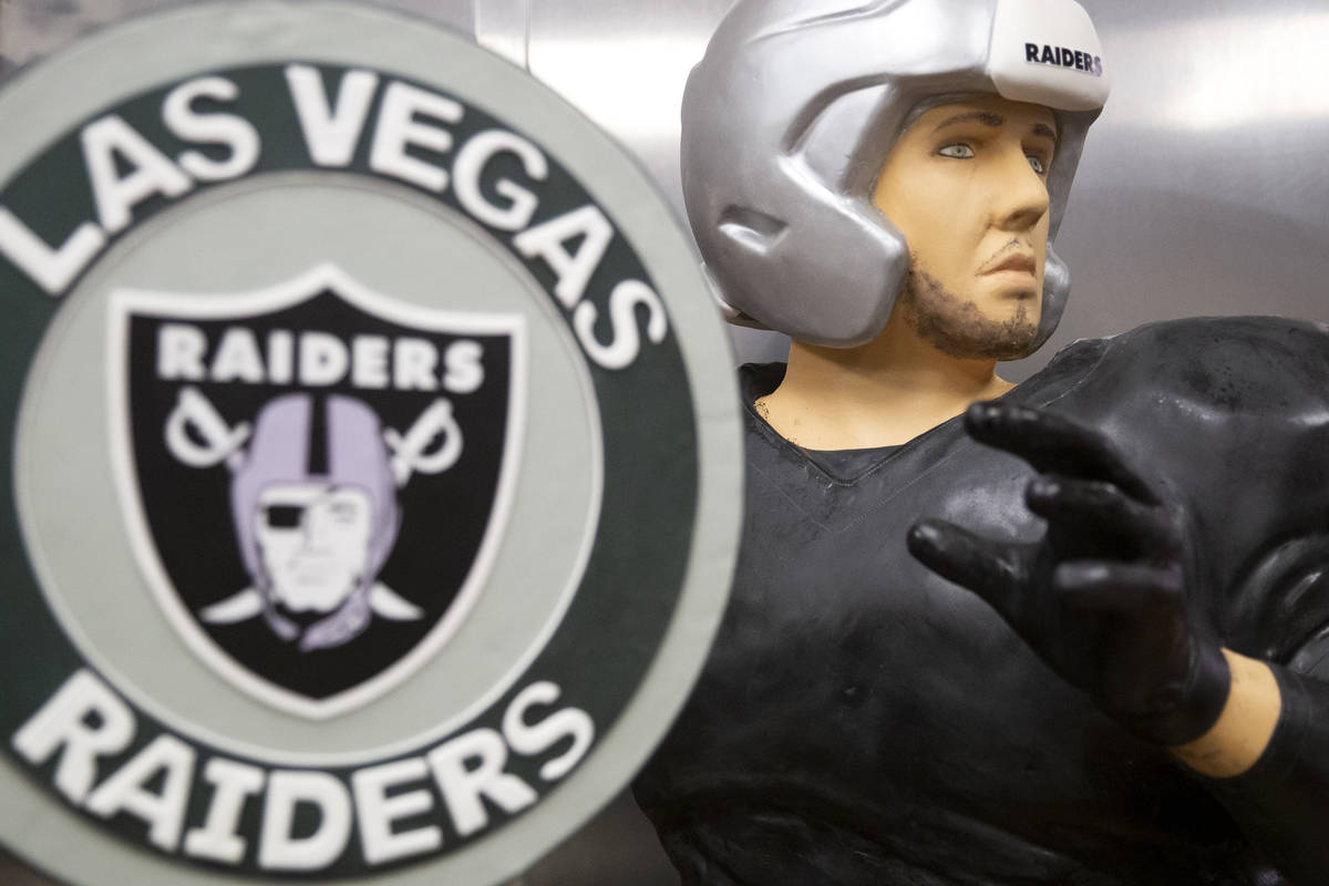 The life-size chocolate Derek Carr confection and a Las Vegas Raiders cake awaits finishing tou ...