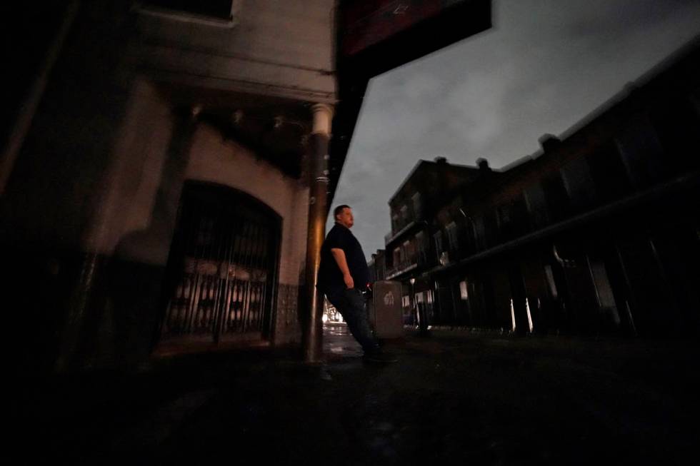 Greg Nazarko, manager of the Bourbon Bandstand bar on Bourbon Street, leans against a pole outs ...