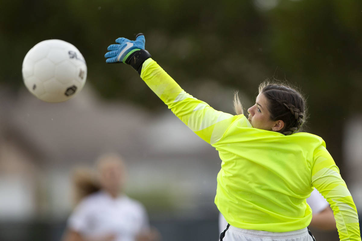 Foothill's goaltender Lexie Qualls (19) saves a goal shot by Green Valley during their high sch ...