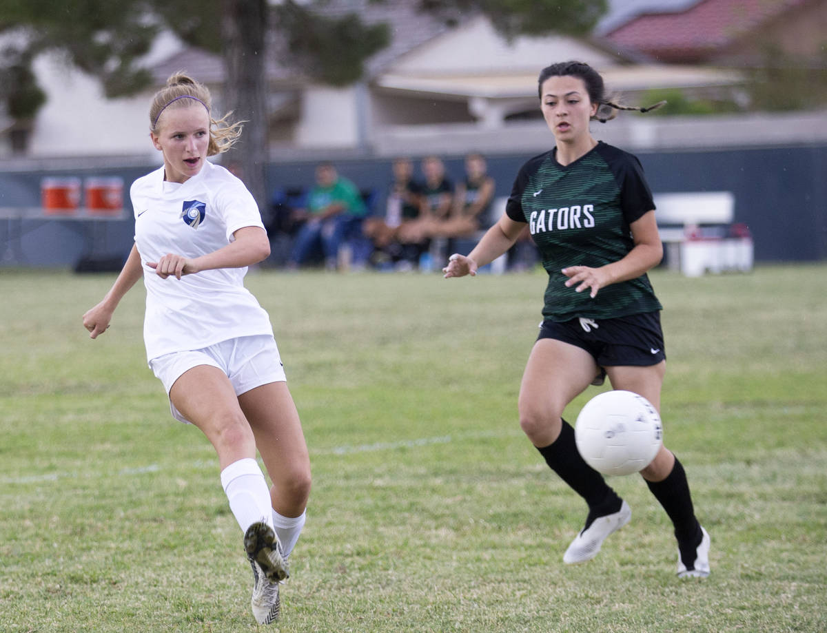 Foothill's Emma Rietz (9) scores a goal on Green Valley next to Green Valley's Brenna Knight (1 ...