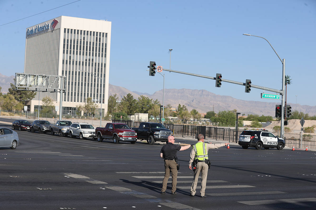 Police investigate a shooting Sunday, Aug. 29, 2021, near Rainbow and Westcliff boulevards in L ...