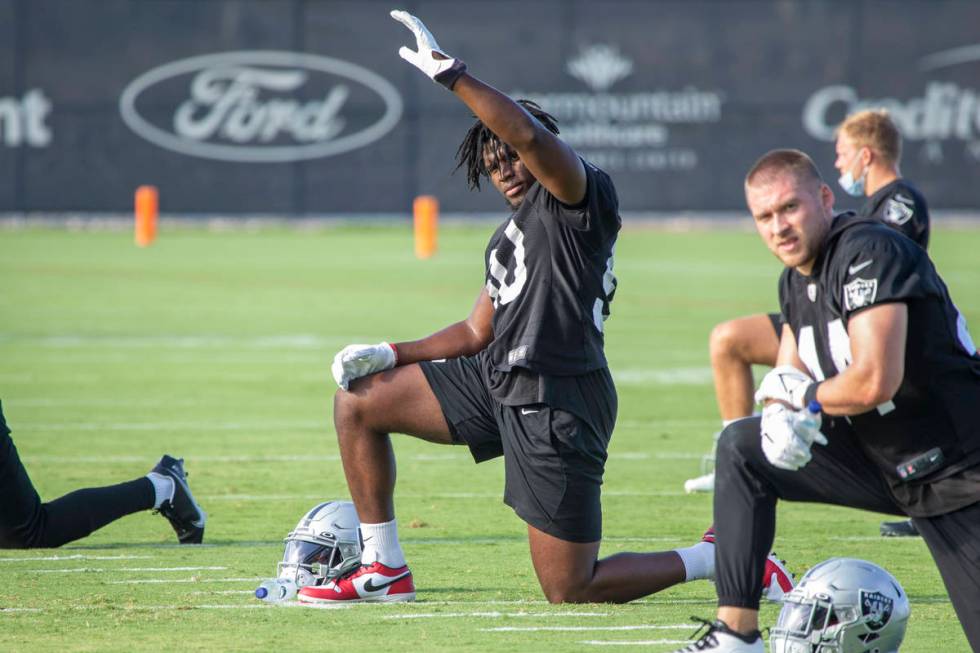 Raiders linebacker Nicholas Morrow (50) stretches during the teamÕs NFL training camp prac ...
