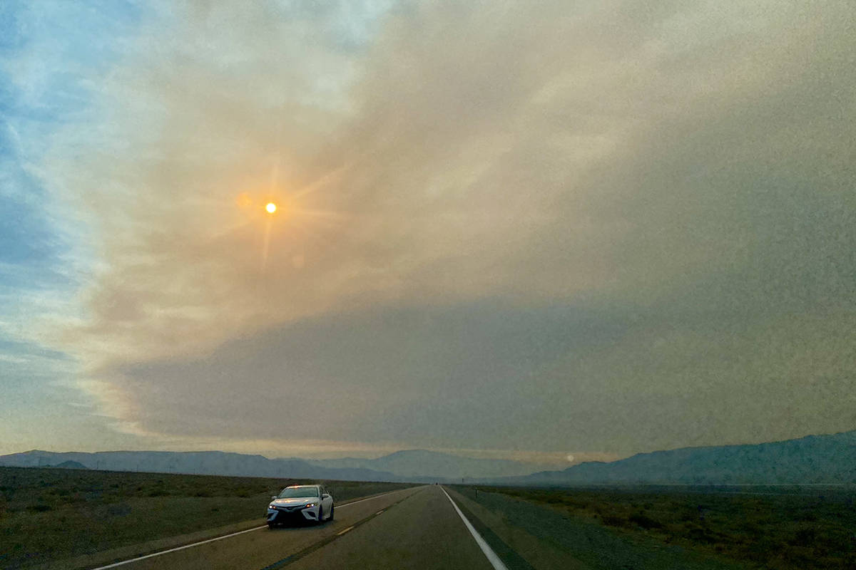 Smoke and clouds dominate the skies Tuesday, Aug. 31, 2021, on U.S. Highway 95 near Hawthorne. ...