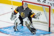 Golden Knights goaltender Robin Lehner (90) stops a puck from a teammate during the warm ups of ...
