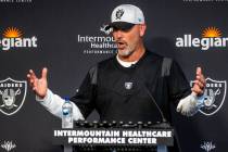 Raiders New Defensive Coordinator Gus Bradley answers a media question during training camp at ...