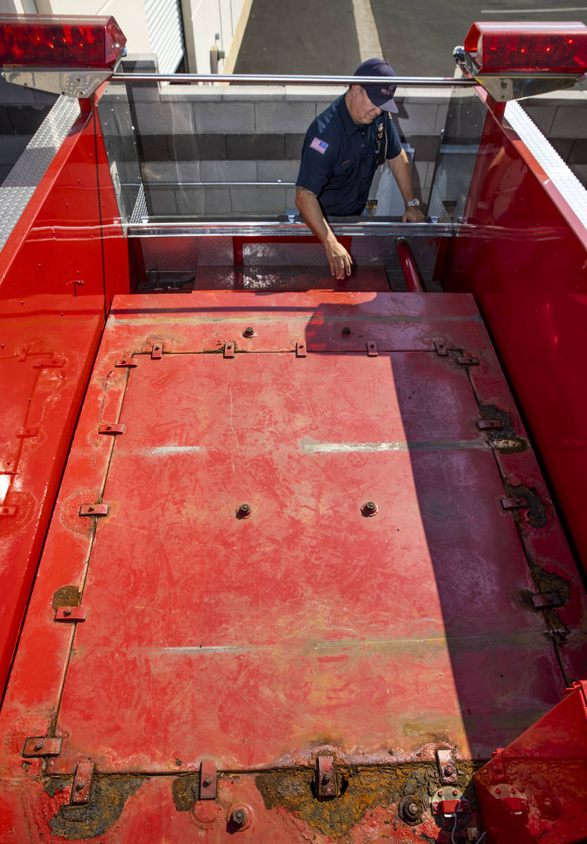 Nick Giolito looks at the bed of the 1991 Pierce Pumper fire engine, which will be used as a ca ...