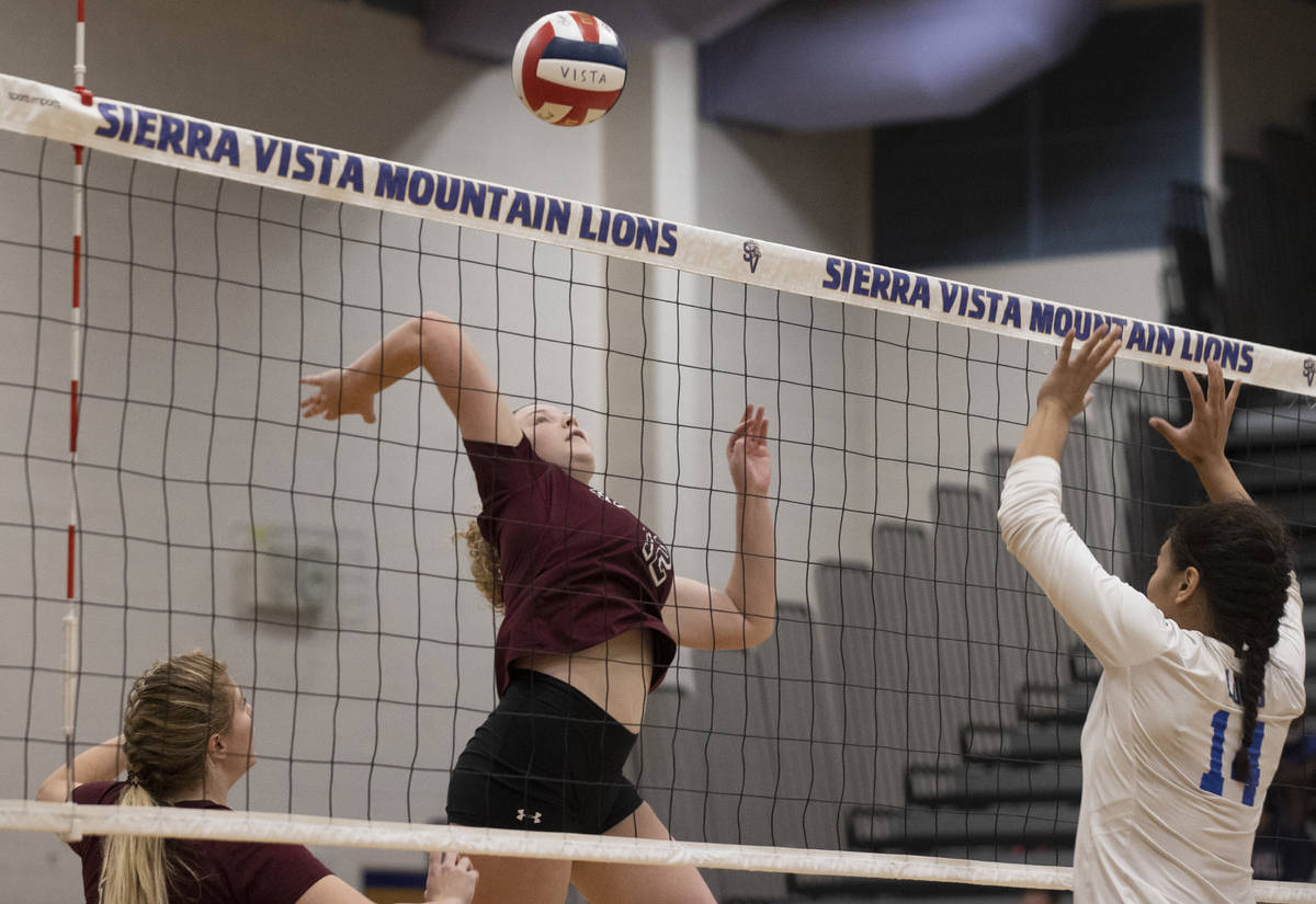 Faith Lutheran’s Delaney Wilson (12) scores over Sierra Vista’s Nazzirene-Alliz M ...