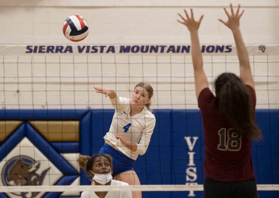 Sierra Vista’s Maysen Bruschke (4) serves during a girls high school volleyball game aga ...