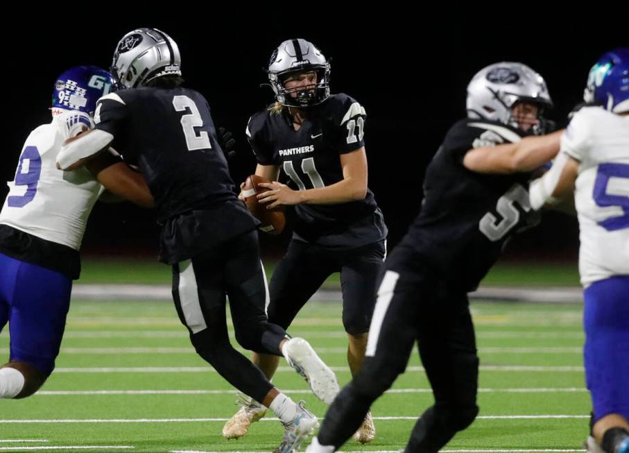 Palo Verde High School's quterback Brady DeNardin (11) looks to throw the ball against Green Va ...