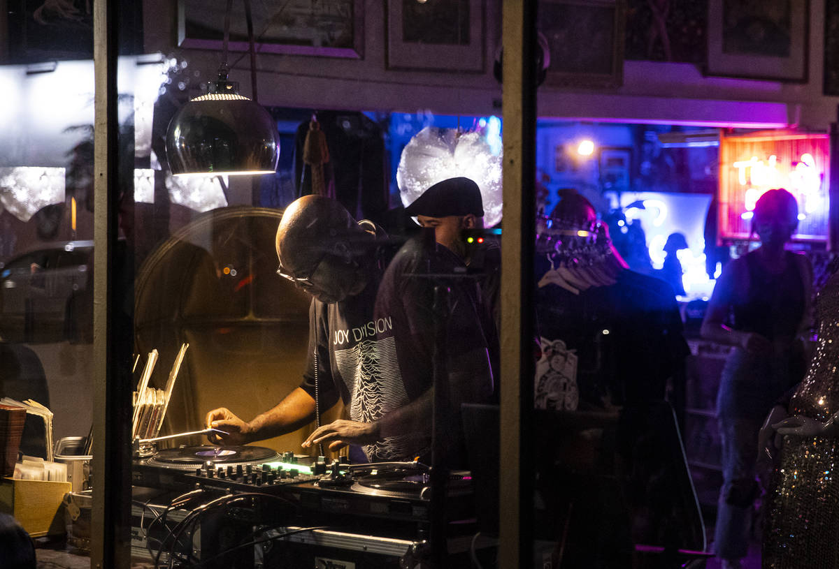 A DJ performs at Vintage Vegas Antiques during First Friday in the Arts District of downtown La ...