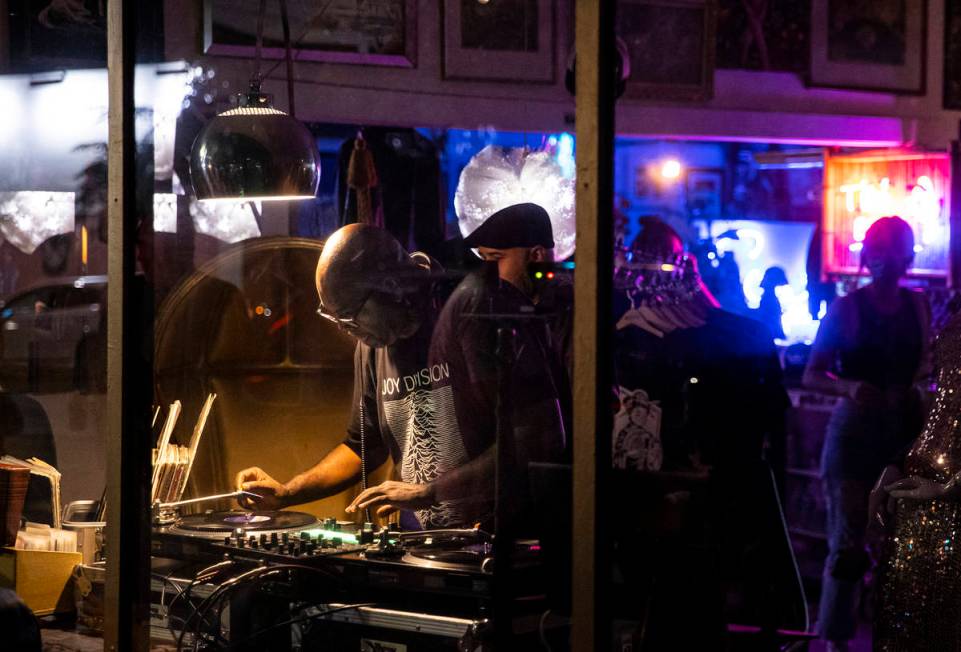 A DJ performs at Vintage Vegas Antiques during First Friday in the Arts District of downtown La ...
