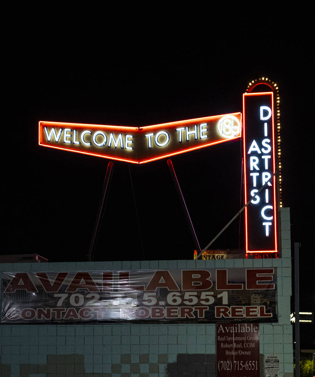 A sign for the Arts District is pictured on Main Street during First Friday in the Arts Distric ...