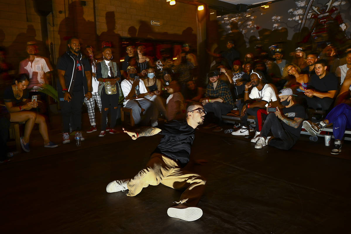 Anthony “A-HAT” Hatmaker competes to win in the dance battle at Ninja Karaoke during First ...