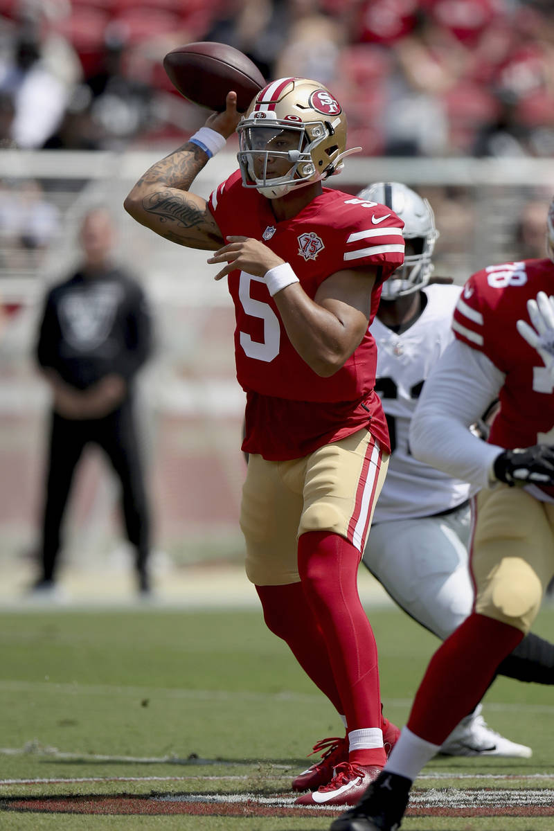 San Francisco 49ers quarterback Trey Lance (5) in action during an NFL football game against th ...