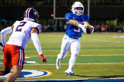 Bishop Gorman's Cam'ron Barfield (3) runs for a touchdown during the second quarter of a footb ...